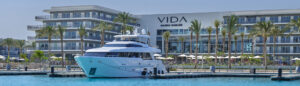 Luxury yacht docked at the marina in front of the Vida Marina Marassi hotel in Egypt